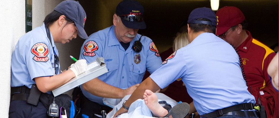 EMS Reserve EMTs treating a patient at an event