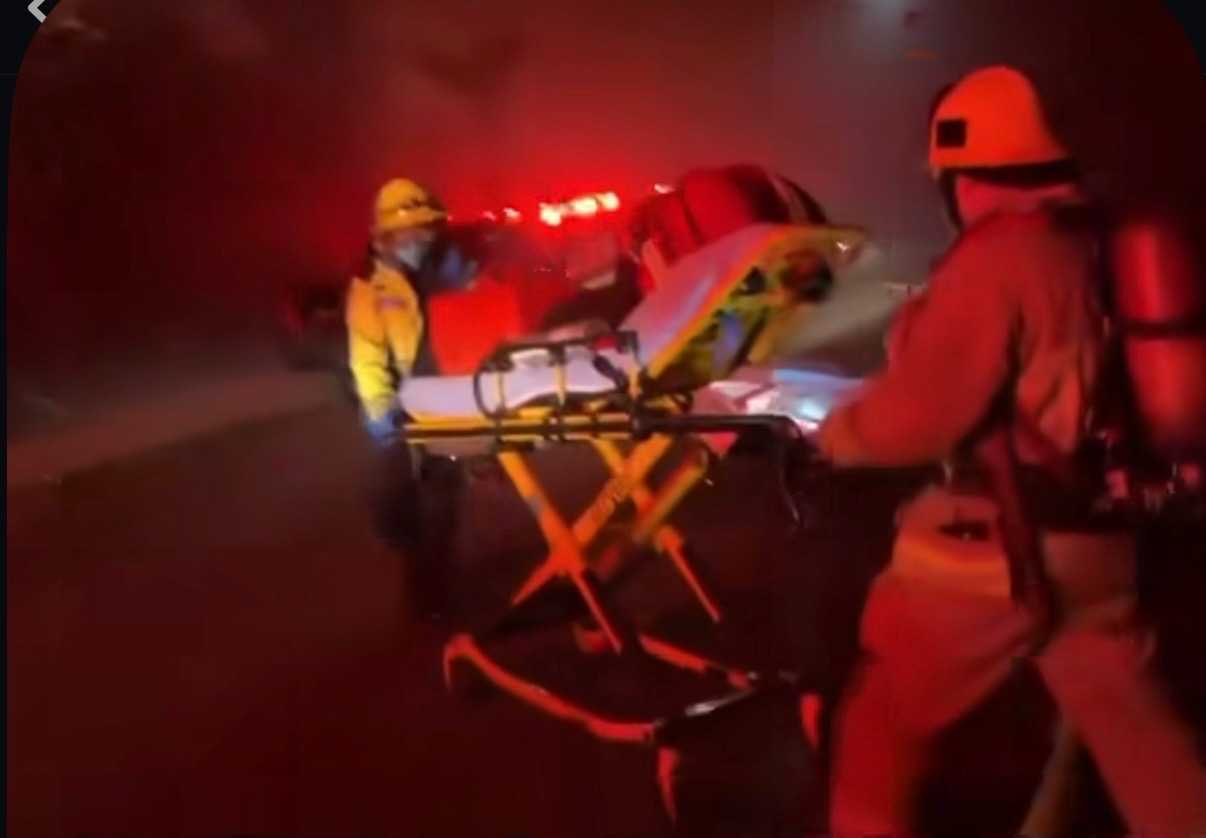EMS Reserve and firefighter responding to a medical emergency during the Eaton Fire