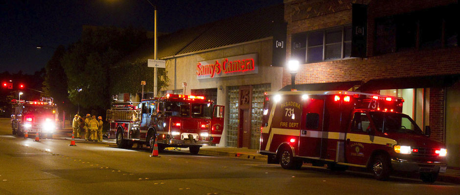 Pasadena Fire Department ambulance and engines at a nighttime street incident